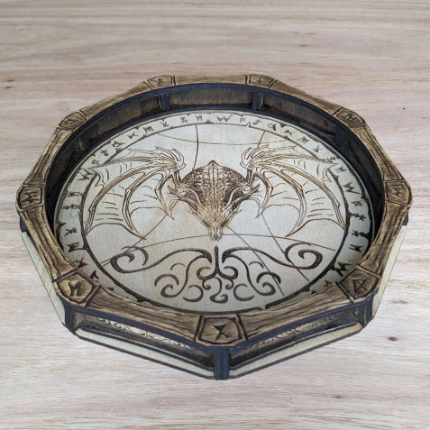 Wooden octagonal dice tray with rune-engraved surface, designed for tabletop gaming and fantasy decor.