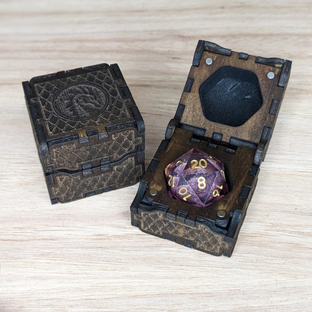 Handcrafted wooden dice vault with engraved lid and gemstone storage compartment, made for tabletop RPG players.