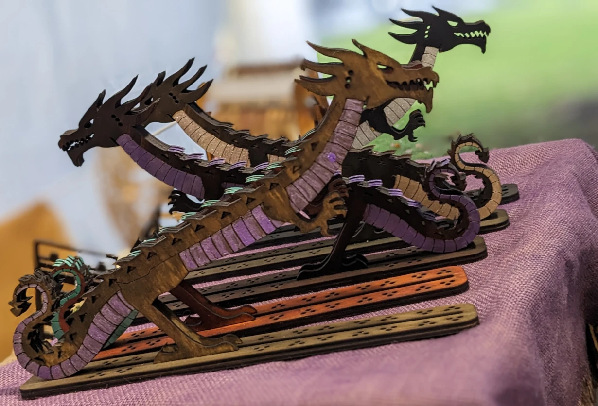 Laser-cut dragon insprired decor, representing handcrafted fantasy decor for dragon lovers.